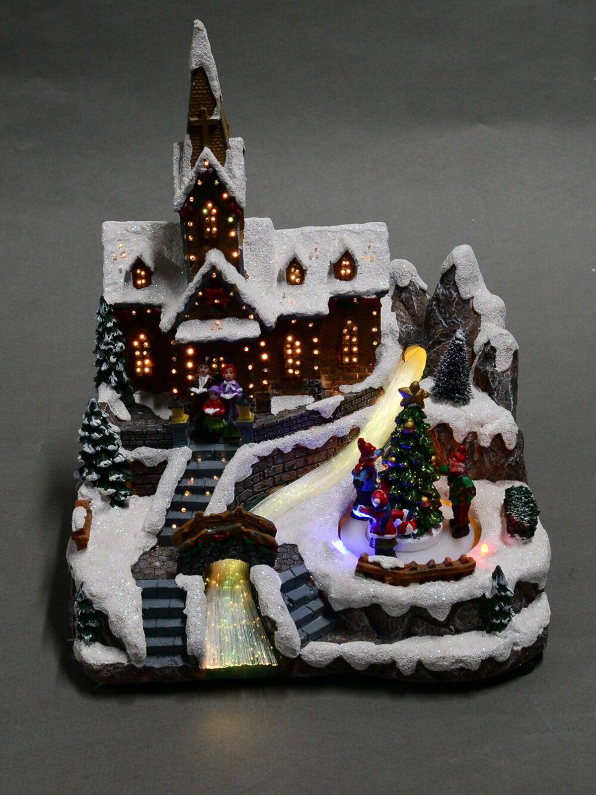 Snow Capped Church Village Scene With Moving Children & Led Lights - 25cm